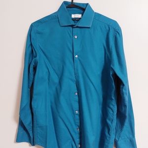 Slim fit Calvin Klein dress shirt. 15 1/2 neck, 32/33. Teal.